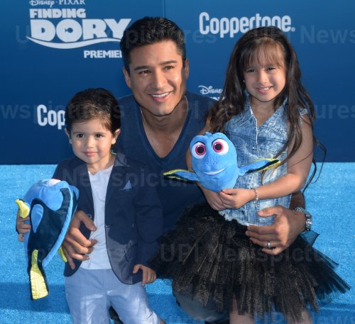 Mario Lopez and children attend the "Finding Dory" premiere in Los Angeles