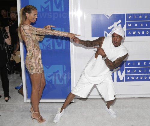 Heidi Klum and Nick Cannon arrive at the 2016 MTV Video Music Awards