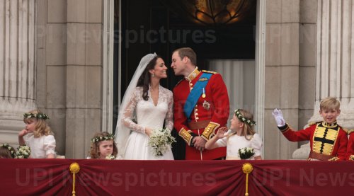 Prince William and Princess Catherine kiss after their wedding.