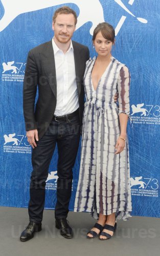 Michael Fassbender and Alicia Vikander at a photo call for The Light Between Oceans at the 73rd Venice Film Festival in Venice