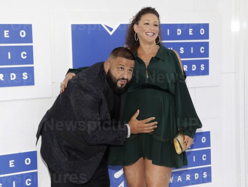 DJ Khaled and Nicole Tuck arrive at the 2016 MTV Video Music Awards