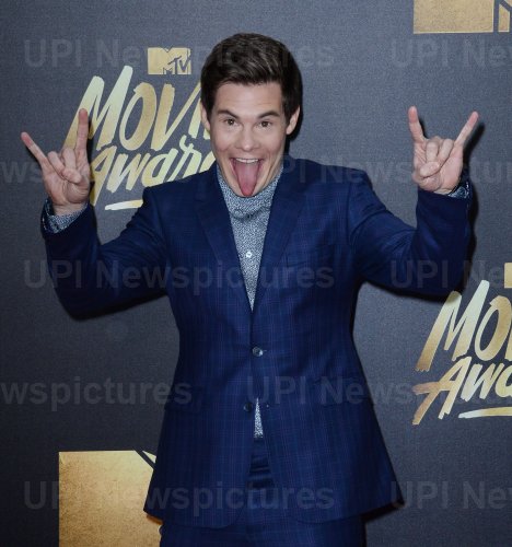 Adam DeVine attends the MTV Movie Awards in Burbank, California