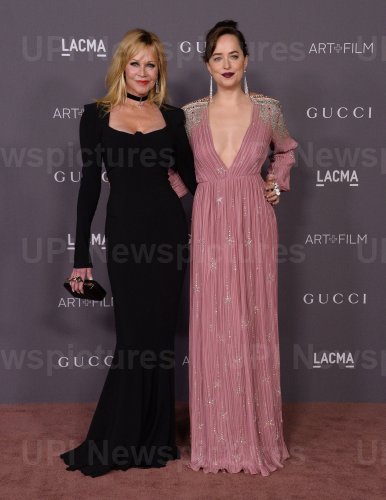 Melanie Griffith and Dakota Johnson attend the LACMA Art+Film gala in Los Angeles