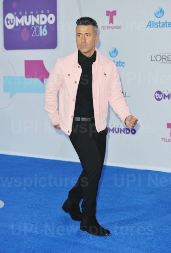 Latin Artist Jorge Bernal Walks The Blue Carpet at the 2016 Premios Tu Mundo Show