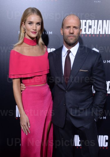 Jason Statham and Rosie Alice Huntington-Whiteley attend "Mechanic: Resurrection" premiere in Los Angeles