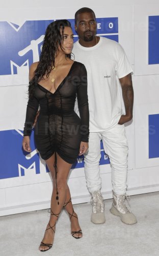 Kim Kardashian West and Kanye West arrive at the 2016 MTV Video Music Awards